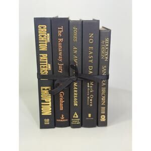 black book collection , black book stack, black and gold vintage books